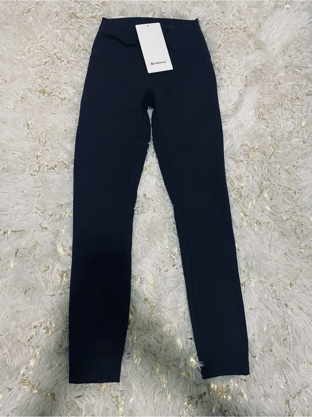 lululemon athletica Black Wunder Train High-Rise Tight 25". Size. 4 - Picture 10 of 14